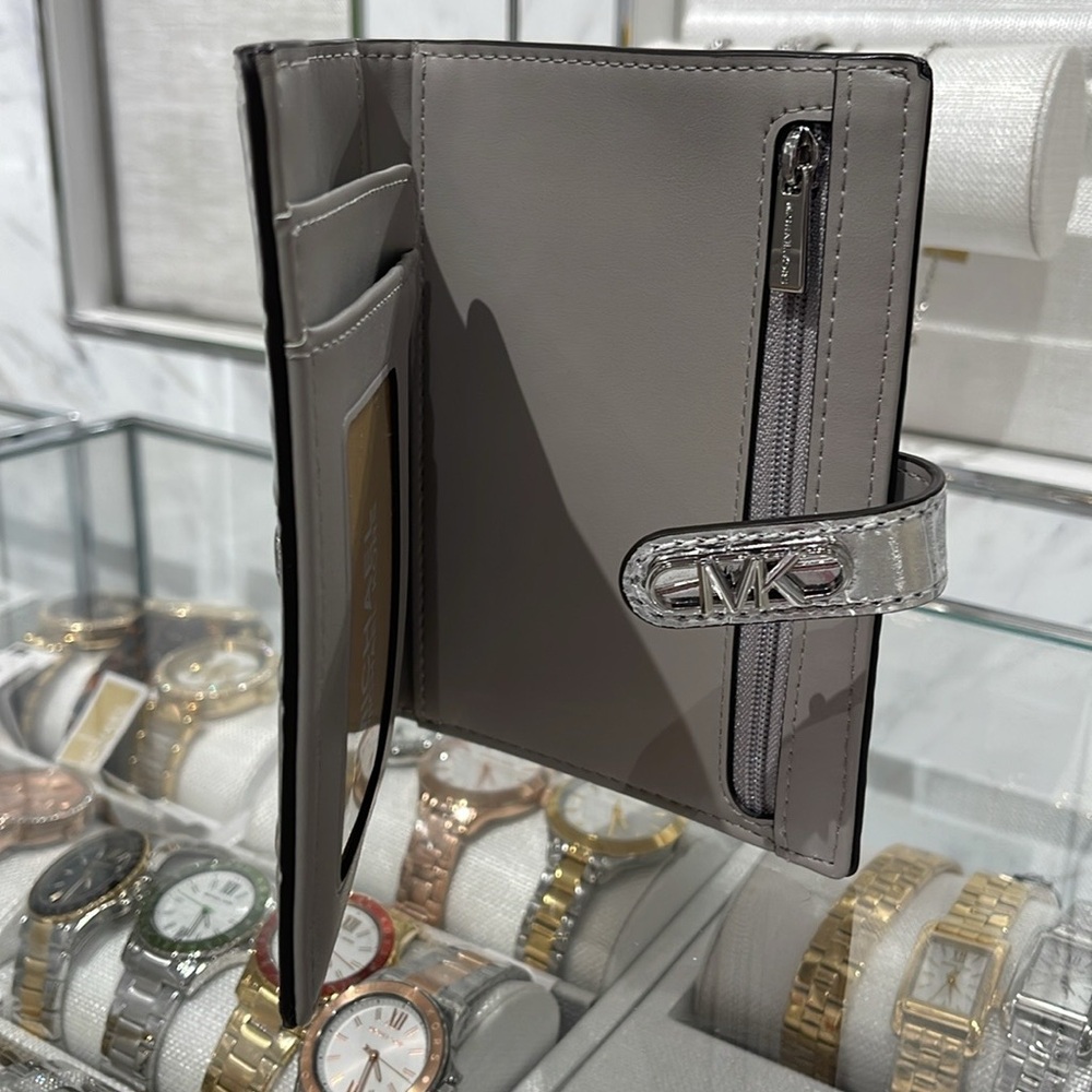 Michael Kors Empire Metallic Crocodile Embossed Leather Passport Wallet
Silver - Picture 16 of 16